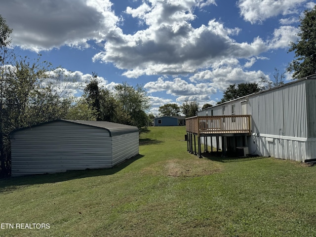 11806 Dry Valley Rd, Loudon, TN 37774 - view of green lawn featuring a wooden deck and central air condition unit