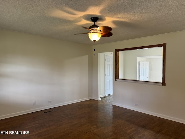 11806 Dry Valley Rd, Loudon, TN 37774 - spare room featuring wood finished floors, a ceiling fan, baseboards, and a textured ceiling