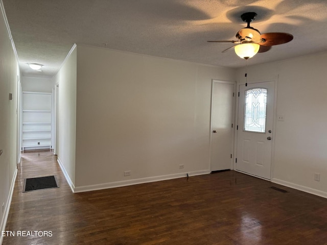 11806 Dry Valley Rd, Loudon, TN 37774 - entrance foyer featuring a textured ceiling, wood finished floors, ceiling fan, and baseboards