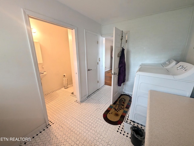 laundry room featuring washing machine and dryer