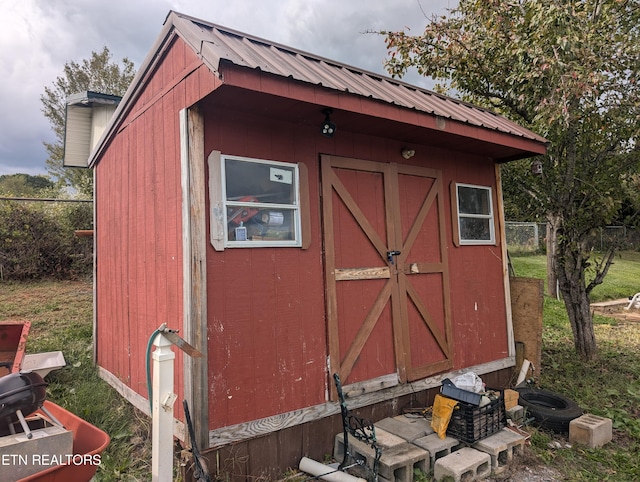 1005 Monroe St, Sweetwater, TN 37874 - view of shed featuring fence