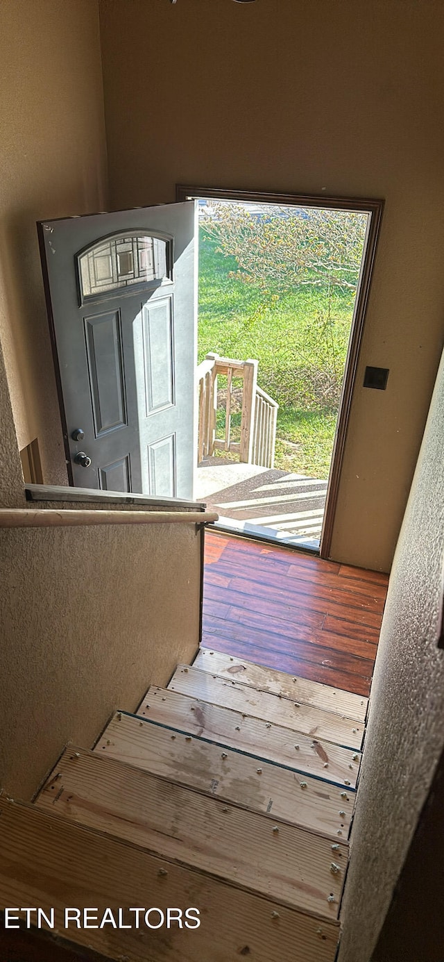 interior space with a balcony