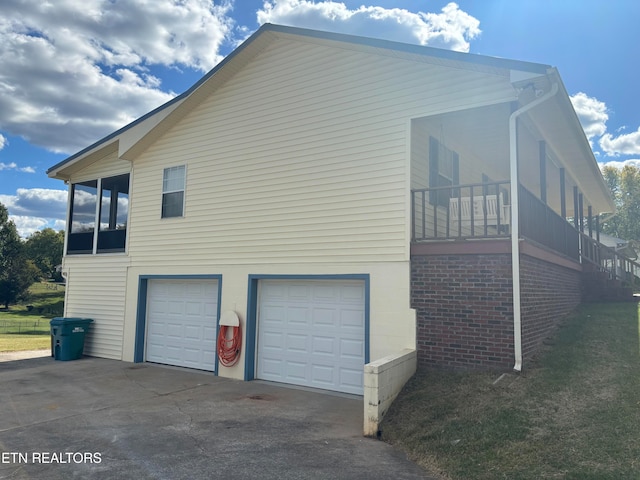 view of property exterior with a garage