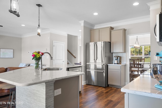 kitchen with gray cabinets, light stone counters, dark wood-type flooring, and stainless steel refrigerator