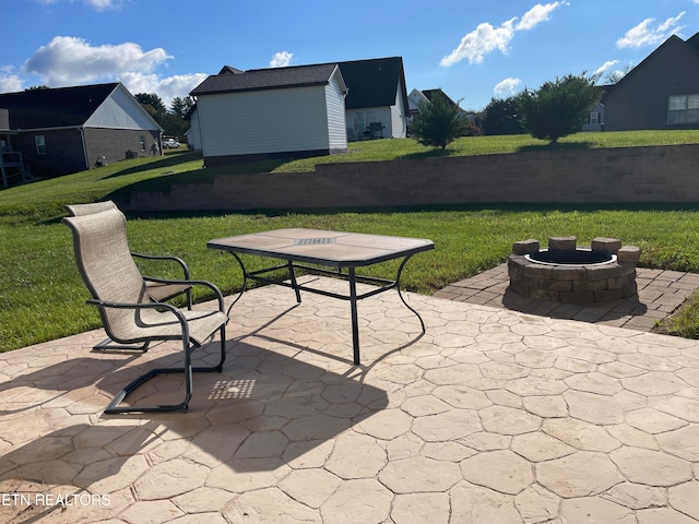 view of patio featuring a fire pit