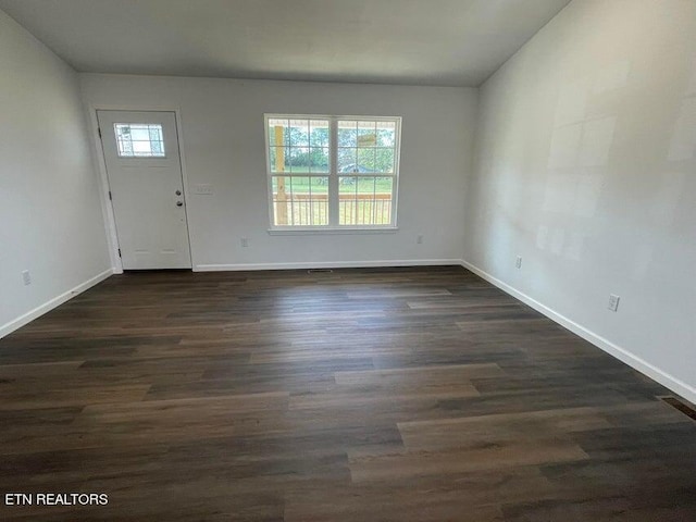 foyer featuring dark hardwood / wood-style floors