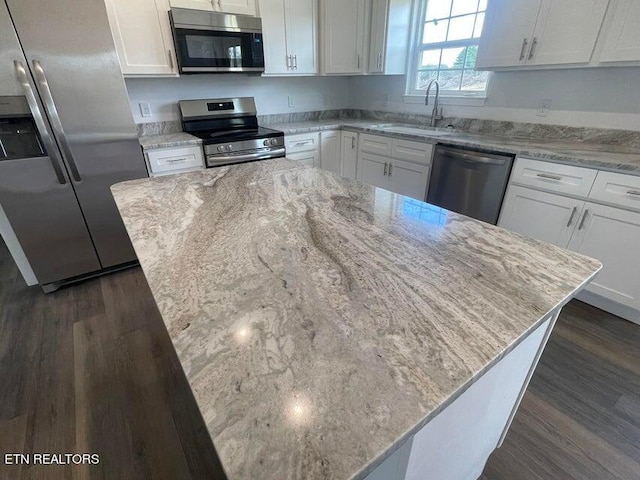 kitchen with stainless steel appliances and a kitchen island