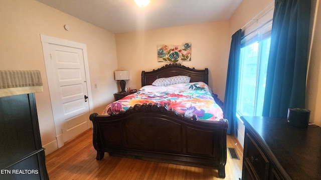 bedroom featuring light hardwood / wood-style floors