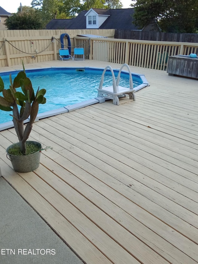 view of pool featuring a deck