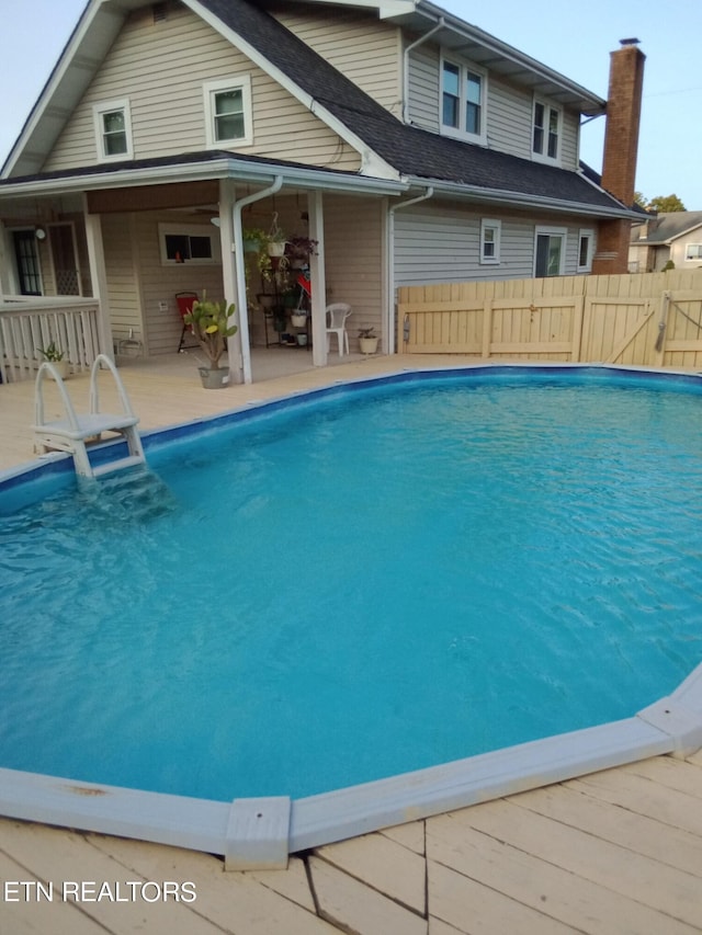 view of swimming pool featuring a patio area