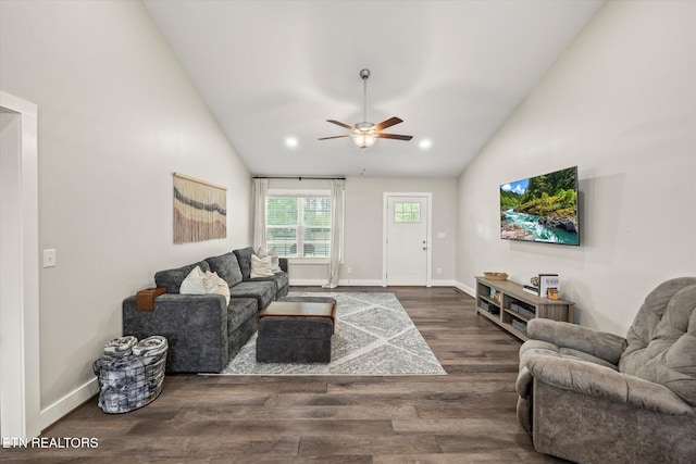 living room with dark hardwood / wood-style floors, high vaulted ceiling, and ceiling fan