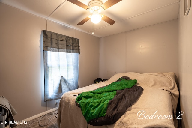 bedroom featuring ceiling fan