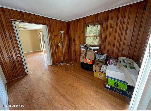 storage area featuring ceiling fan