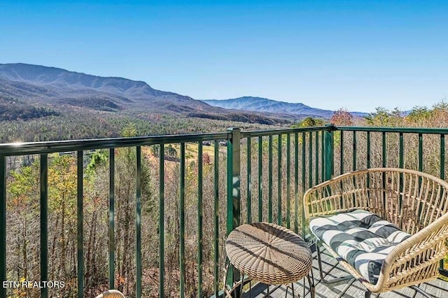 balcony featuring a mountain view