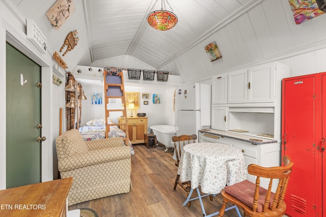 living room with hardwood / wood-style floors, vaulted ceiling, and wood ceiling