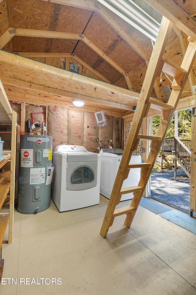 washroom with electric water heater and separate washer and dryer