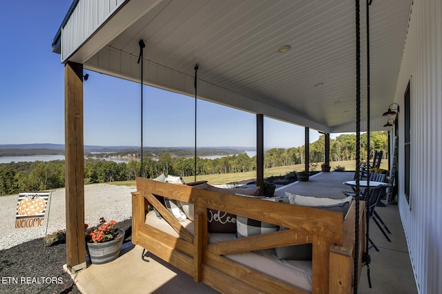 view of patio / terrace featuring a water view