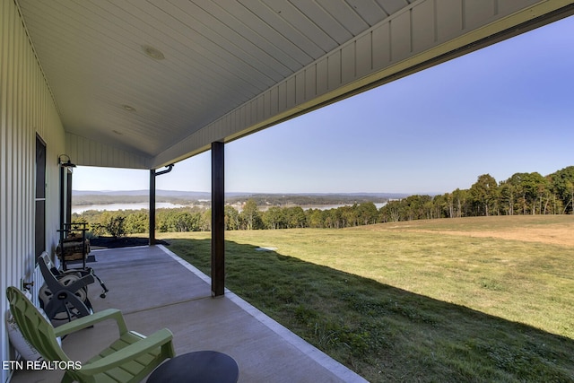 view of patio / terrace featuring a water view