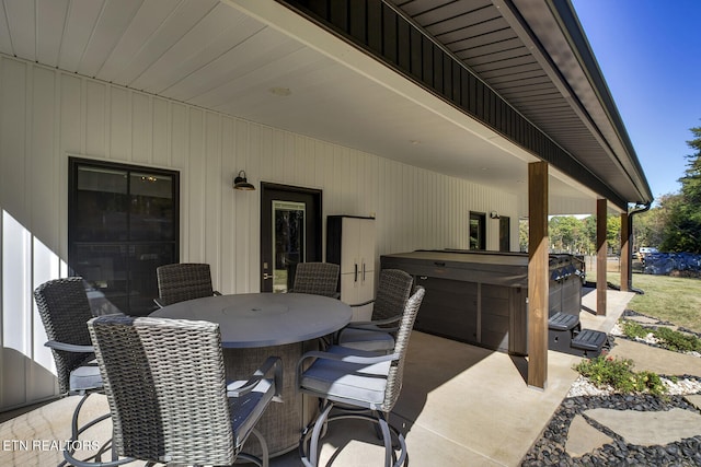 view of patio / terrace featuring a hot tub