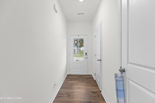 doorway to outside with dark hardwood / wood-style flooring