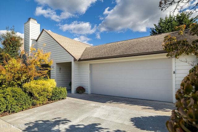 ranch-style home with a garage