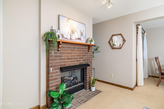 carpeted living room with a textured ceiling and a fireplace