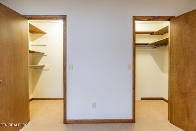 interior space featuring light colored carpet