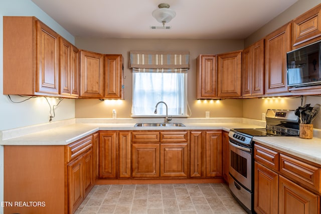 kitchen with sink and stainless steel electric range oven