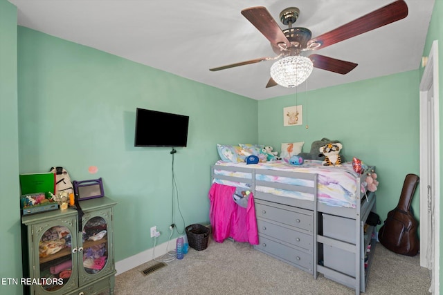 carpeted bedroom with ceiling fan