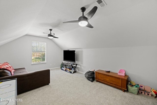 home theater featuring lofted ceiling, carpet floors, and ceiling fan