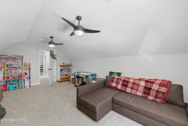 carpeted living room featuring vaulted ceiling and ceiling fan