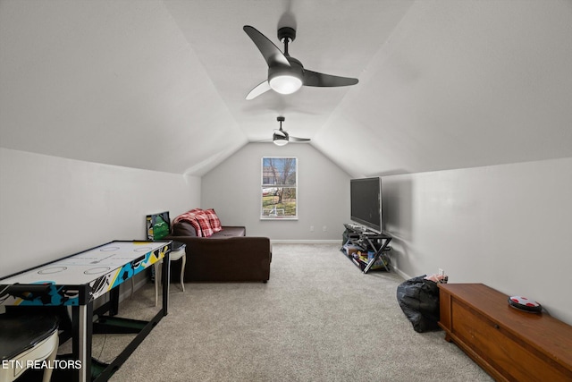 playroom with vaulted ceiling, carpet floors, and ceiling fan