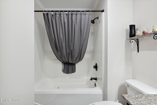 full bathroom featuring toilet, crown molding, shower / bathtub combination with curtain, and vanity