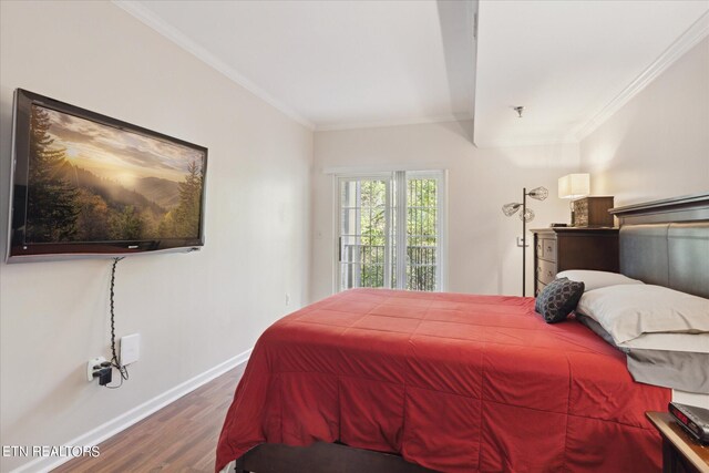 bedroom with hardwood / wood-style flooring and ornamental molding