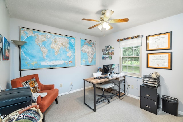 office area featuring ceiling fan, a textured ceiling, and carpet floors