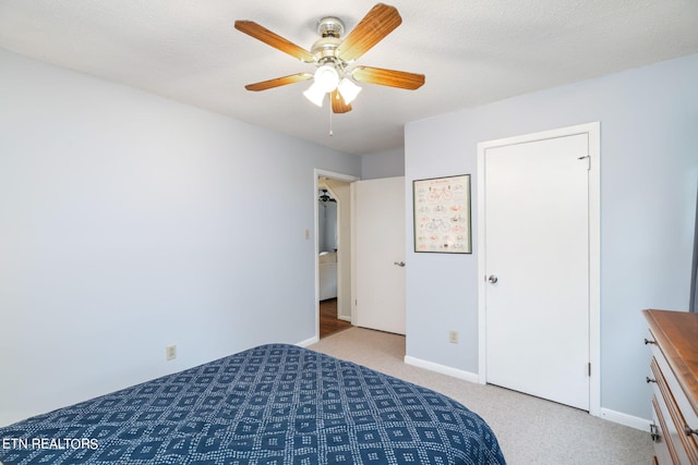 unfurnished bedroom featuring a textured ceiling and ceiling fan