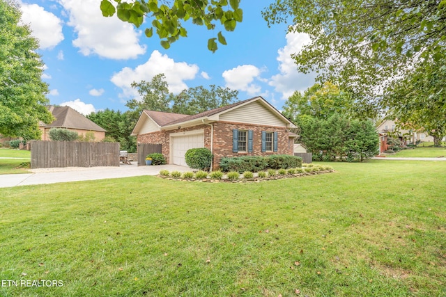 view of front of home with a garage and a front lawn