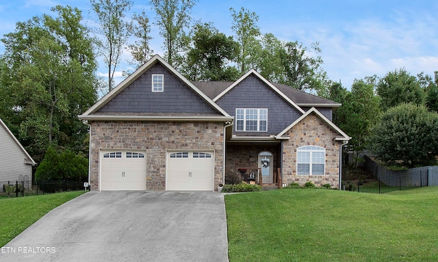 craftsman-style house with a front yard and a garage