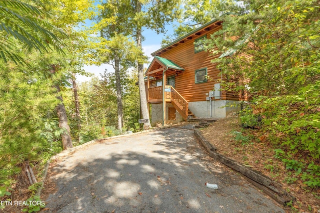 view of log cabin