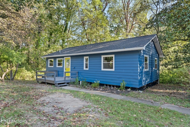 view of front of home with a deck