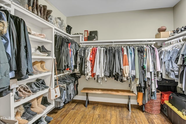 walk in closet featuring hardwood / wood-style floors