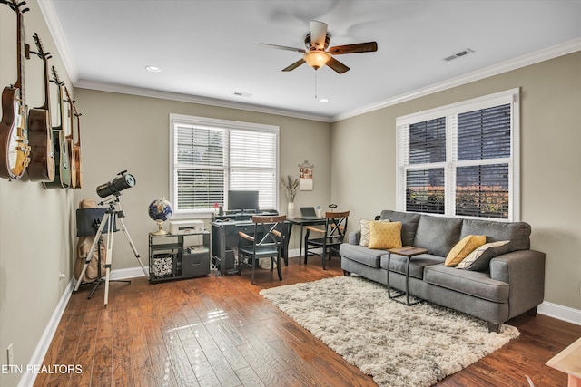 office space with ornamental molding, ceiling fan, and dark hardwood / wood-style flooring