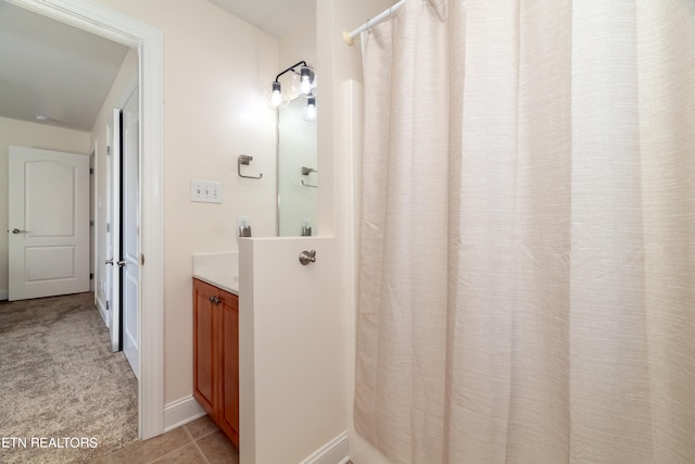 bathroom with vanity and tile patterned floors