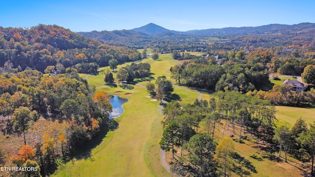 bird's eye view with a water and mountain view