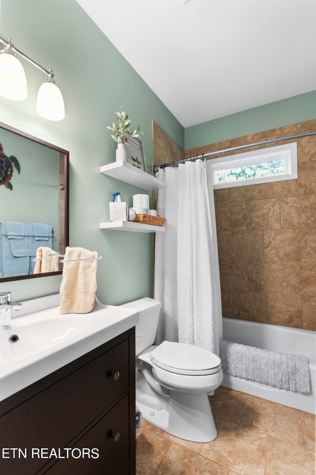 full bathroom with toilet, shower / bath combo, vanity, and tile patterned flooring