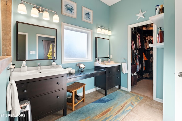 bathroom with vanity and tile patterned floors