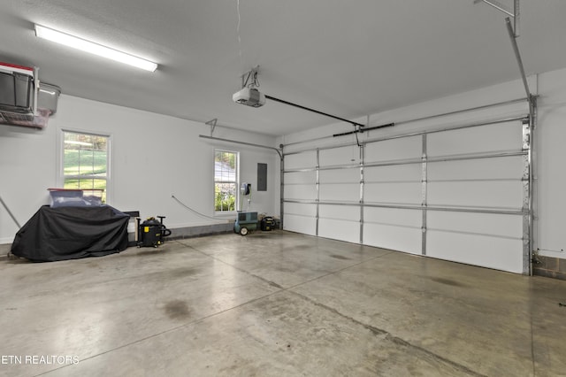 339 Eagles Rdg, Tazewell, TN 37879 - garage with a garage door opener and electric panel