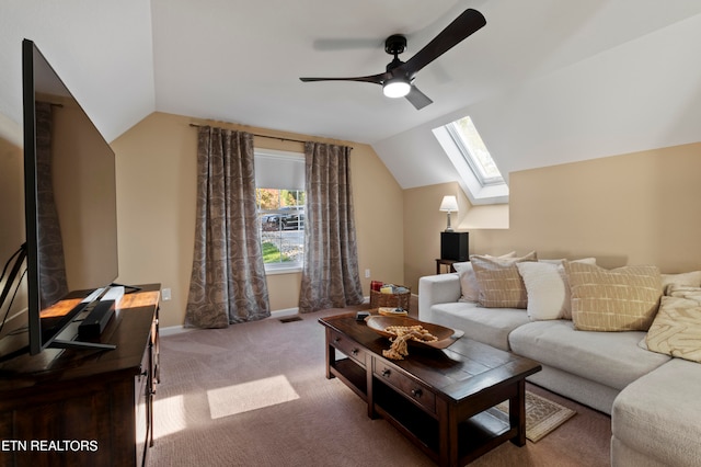 living room with ceiling fan, light colored carpet, and vaulted ceiling