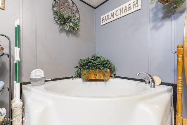 bathroom featuring a tub