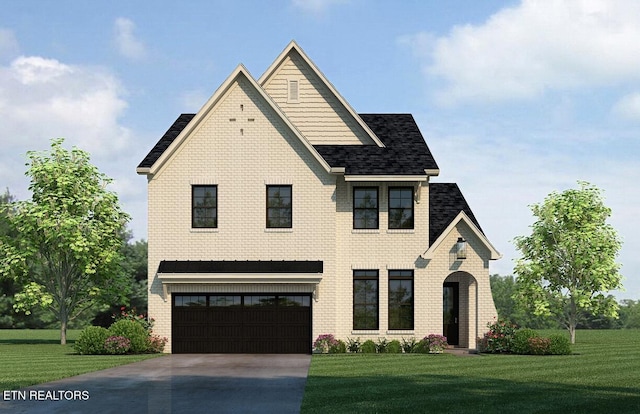 view of front facade with a front yard and a garage